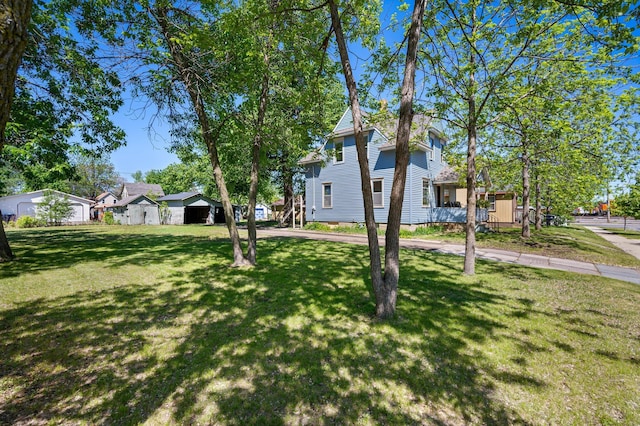 431 19 1/2 Ave N, Saint Cloud, MN 56303 - view of front of property with a front lawn