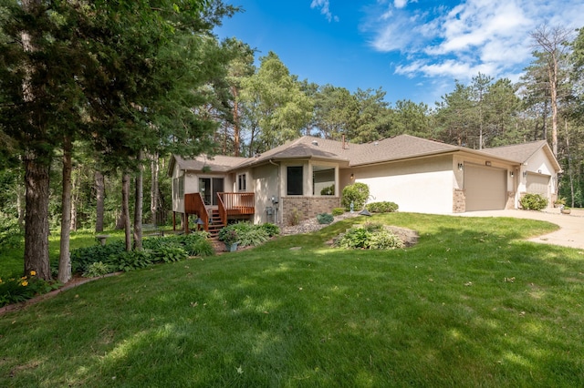 508 Woodside Ct, Shakopee, MN 55379 - view of front of home featuring an attached garage, concrete driveway, stucco siding, a front lawn, and a deck