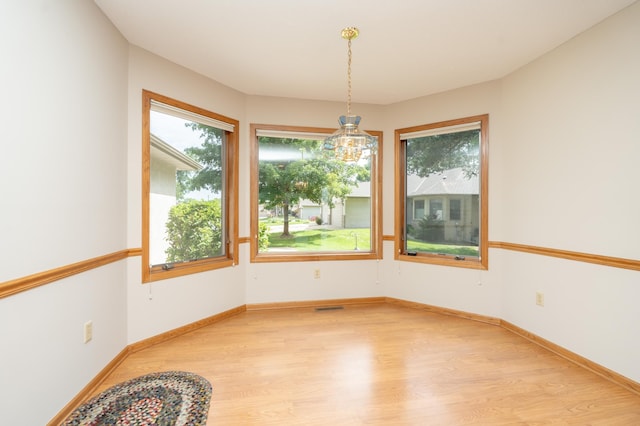 508 Woodside Ct, Shakopee, MN 55379 - spare room with light wood-style floors and baseboards