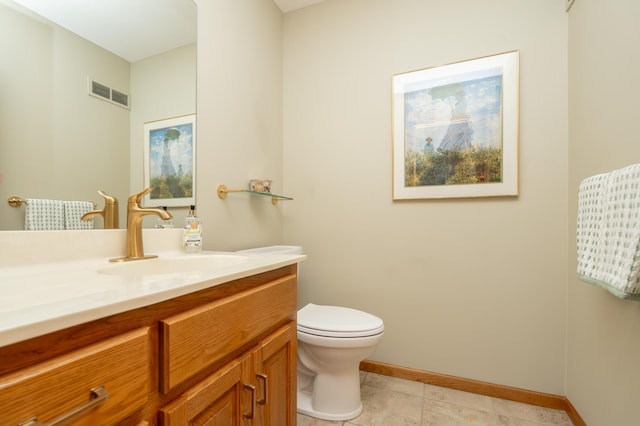 508 Woodside Ct, Shakopee, MN 55379 - half bathroom with vanity and tile patterned flooring