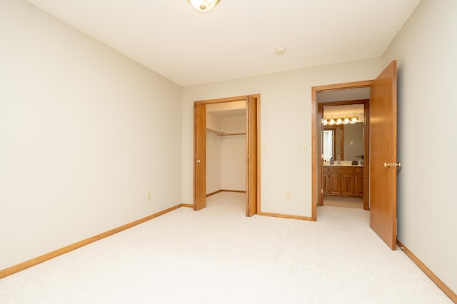 508 Woodside Ct, Shakopee, MN 55379 - unfurnished bedroom with light colored carpet, a closet, and a spacious closet