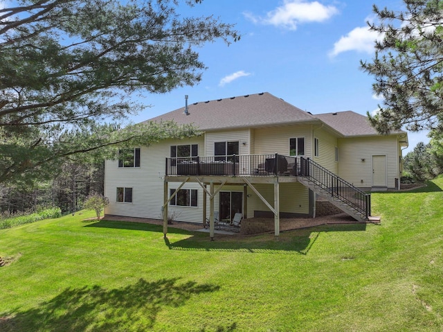 13725 Maxwell Rd, Chisago Lake Twp, MN 55013 - back of house with a deck, stairway, a lawn, and roof with shingles
