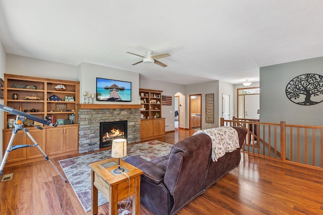 13725 Maxwell Rd, Chisago Lake Twp, MN 55013 - living room with wood finished floors, a ceiling fan, and a fireplace