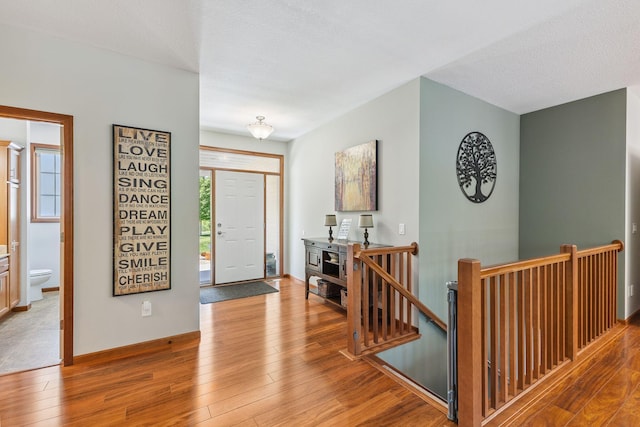 13725 Maxwell Rd, Chisago Lake Twp, MN 55013 - foyer with hardwood / wood-style flooring and baseboards