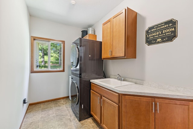 13725 Maxwell Rd, Chisago Lake Twp, MN 55013 - laundry room with stacked washer / drying machine and cabinet space