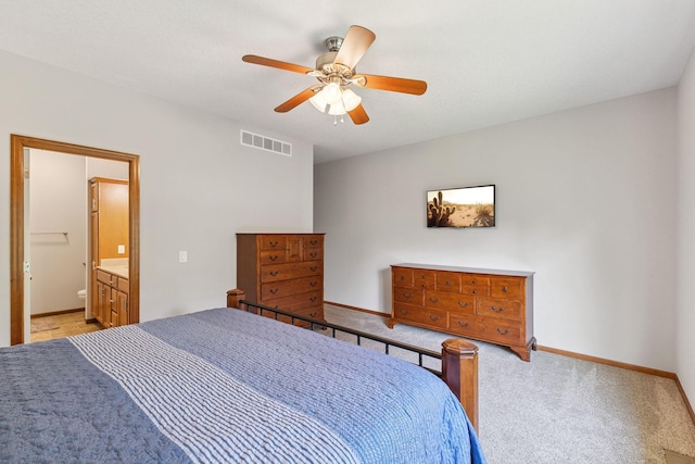 13725 Maxwell Rd, Chisago Lake Twp, MN 55013 - bedroom featuring light carpet, ensuite bathroom, and ceiling fan