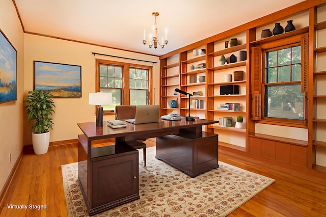210 1st Ave SW, Glenwood, MN 56334 - home office featuring a chandelier and light wood-type flooring
