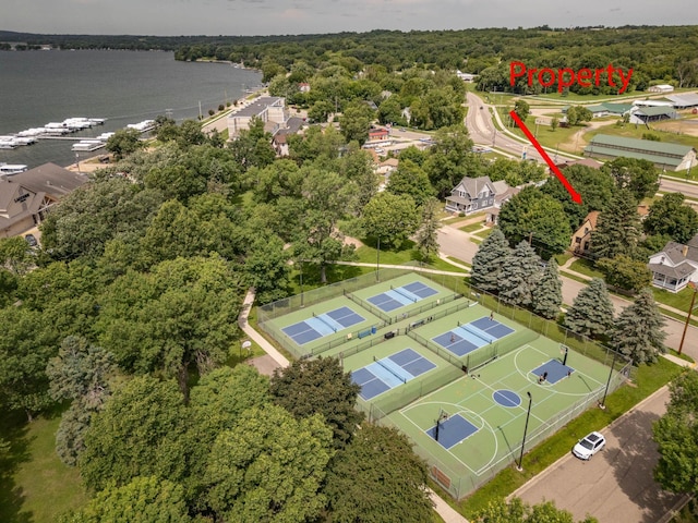 210 1st Ave SW, Glenwood, MN 56334 - drone / aerial view of a heavily wooded area and a large body of water