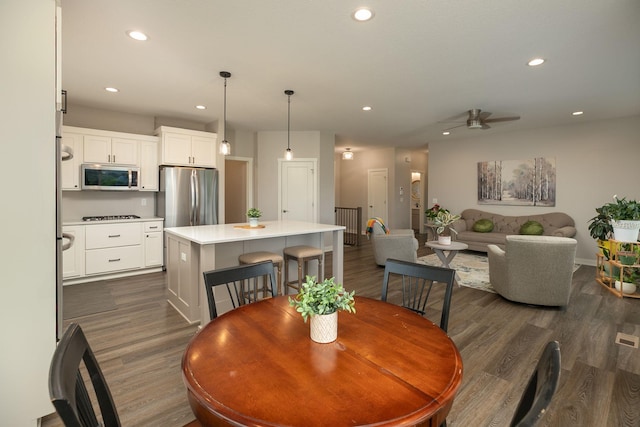 1427 Amco Dr SE, Chatfield, MN 55923 - dining area featuring recessed lighting, a ceiling fan, and dark wood-style floors