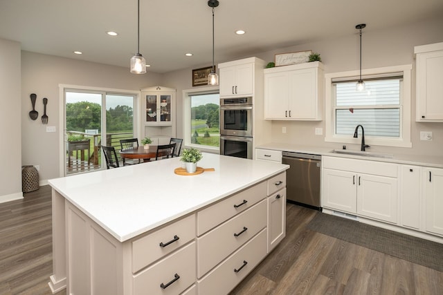 1427 Amco Dr SE, Chatfield, MN 55923 - kitchen featuring stainless steel appliances, dark wood finished floors, white cabinets, light countertops, and recessed lighting