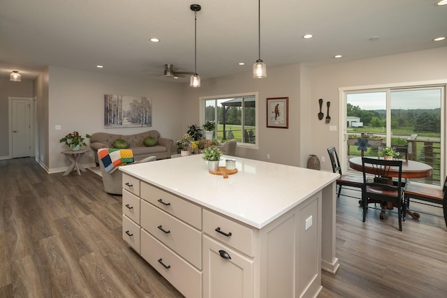 1427 Amco Dr SE, Chatfield, MN 55923 - kitchen featuring recessed lighting, dark wood-style flooring, a kitchen island, light countertops, and a ceiling fan