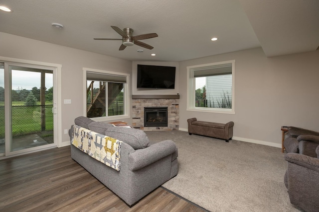 1427 Amco Dr SE, Chatfield, MN 55923 - living room featuring a ceiling fan, recessed lighting, a fireplace, and wood finished floors