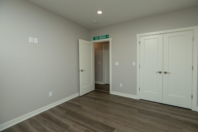 1427 Amco Dr SE, Chatfield, MN 55923 - unfurnished bedroom with dark wood-style flooring, recessed lighting, and a closet