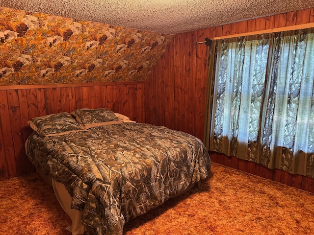 20247 410th Ave, Mickinock Twp, MN 56751 - carpeted bedroom featuring wood walls and lofted ceiling