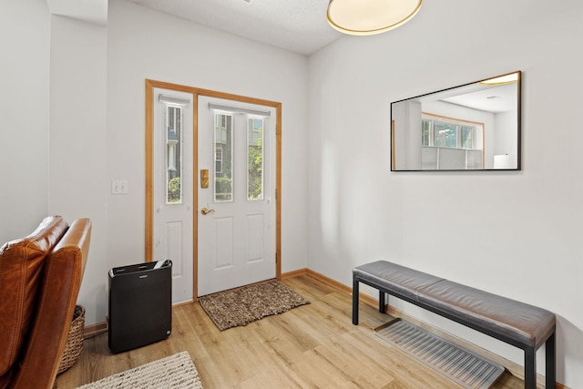 8479 Forestview Ln N, Maple Grove, MN 55369 - foyer with wood finished floors and baseboards