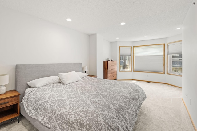 8479 Forestview Ln N, Maple Grove, MN 55369 - carpeted bedroom with recessed lighting and a textured ceiling