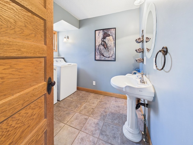 905 3rd Ave SW, Pine City, MN 55063 - bathroom featuring washer / dryer and baseboards