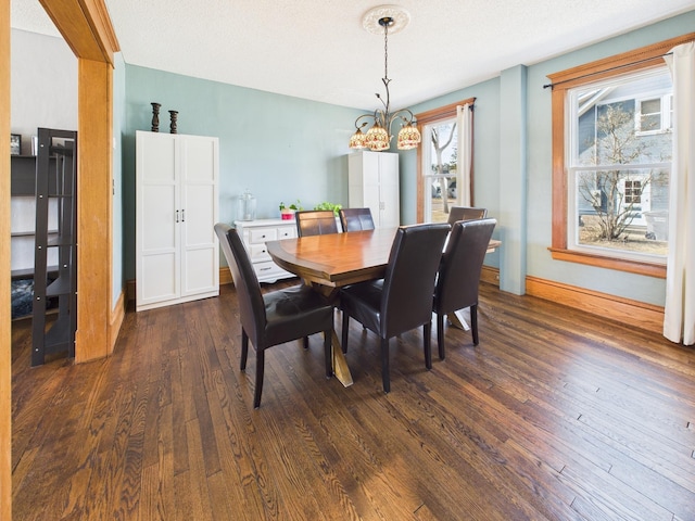 905 3rd Ave SW, Pine City, MN 55063 - dining area with dark wood-style flooring and a chandelier