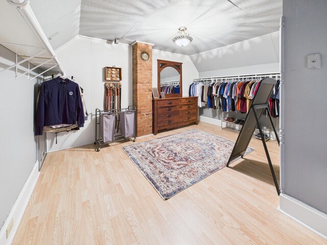 905 3rd Ave SW, Pine City, MN 55063 - walk in closet with vaulted ceiling and wood finished floors