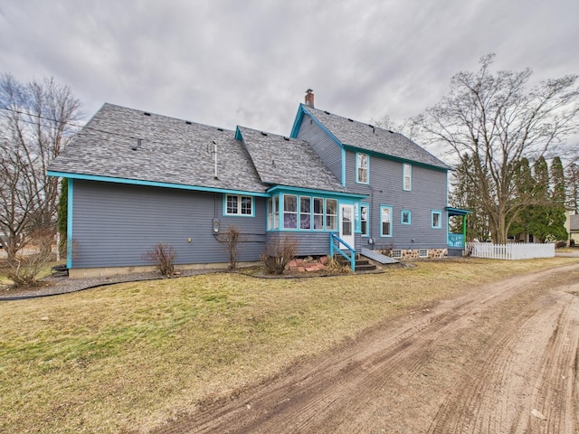 905 3rd Ave SW, Pine City, MN 55063 - rear view of property featuring a chimney and entry steps