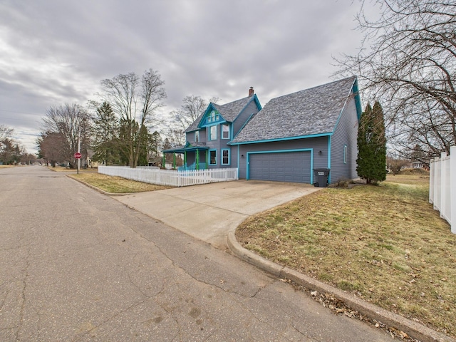 905 3rd Ave SW, Pine City, MN 55063 - victorian-style house with concrete driveway, a garage, and covered porch