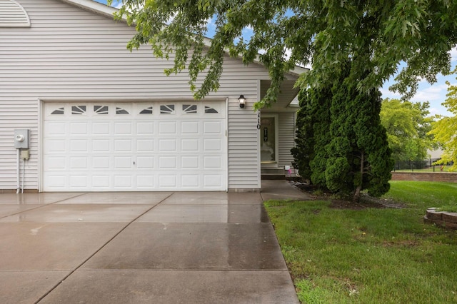 1110 Lilac Ct, Waconia, MN 55387 - view of front of house featuring driveway, a front lawn, and an attached garage