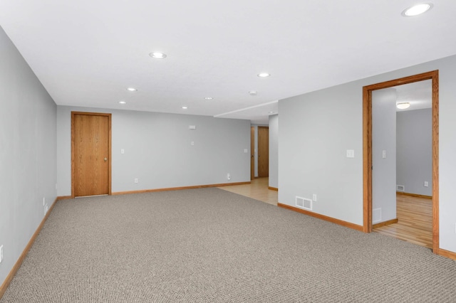 1110 Lilac Ct, Waconia, MN 55387 - empty room featuring recessed lighting and light carpet