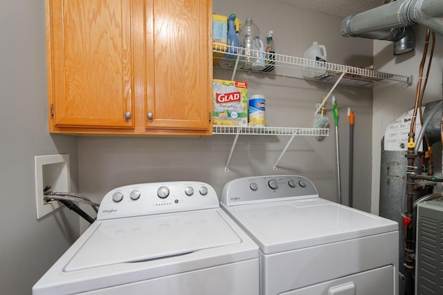 8772 Benson Way Unit 81, Inver Grove Heights, MN 55076 - laundry area featuring washing machine and clothes dryer and cabinet space