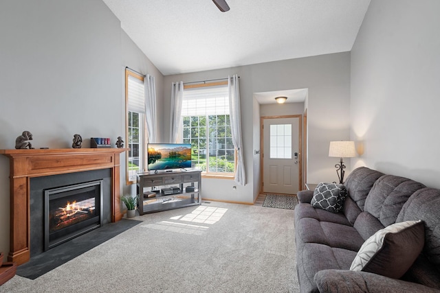 8772 Benson Way Unit 81, Inver Grove Heights, MN 55076 - living room featuring carpet floors, lofted ceiling, and a fireplace with flush hearth
