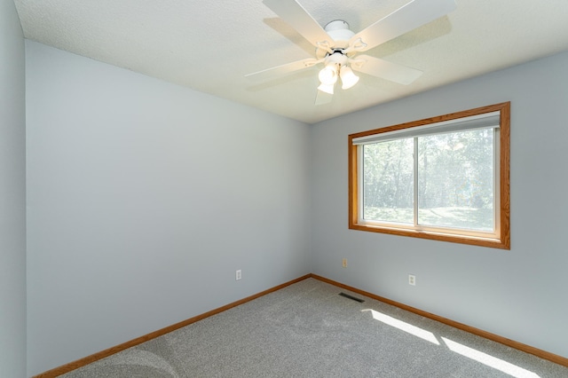 816 Bristol Ln NE, Rochester, MN 55906 - carpeted empty room with baseboards and a ceiling fan