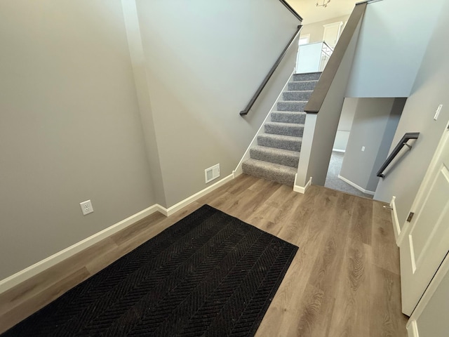 2883 Ivory Ave NE, Saint Michael, MN 55376 - staircase with baseboards and wood finished floors