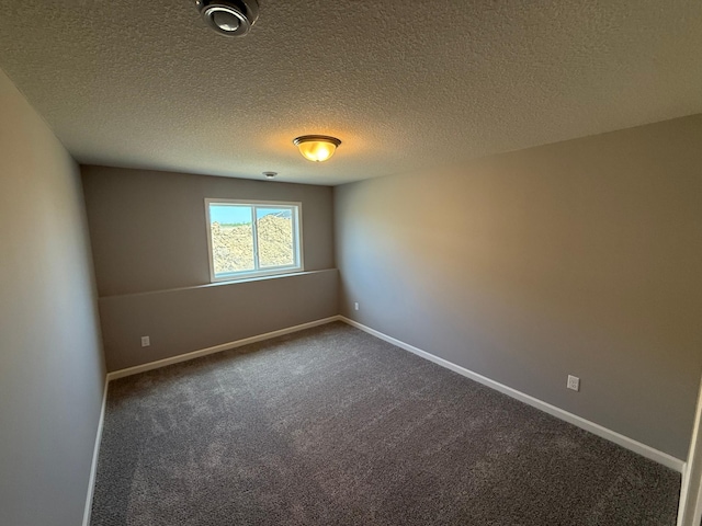 2883 Ivory Ave NE, Saint Michael, MN 55376 - spare room featuring dark colored carpet and a textured ceiling