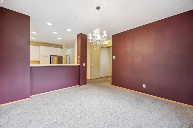 14000 Erwin Ct, Eden Prairie, MN 55344 - unfurnished living room featuring carpet flooring, a chandelier, and recessed lighting