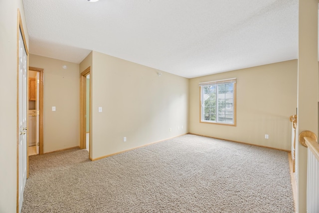 14000 Erwin Ct, Eden Prairie, MN 55344 - empty room featuring carpet floors and a textured ceiling