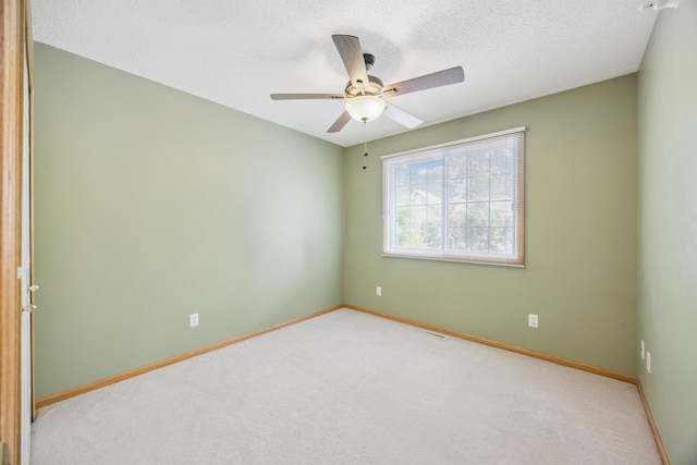 14000 Erwin Ct, Eden Prairie, MN 55344 - empty room featuring carpet floors, a ceiling fan, and a textured ceiling