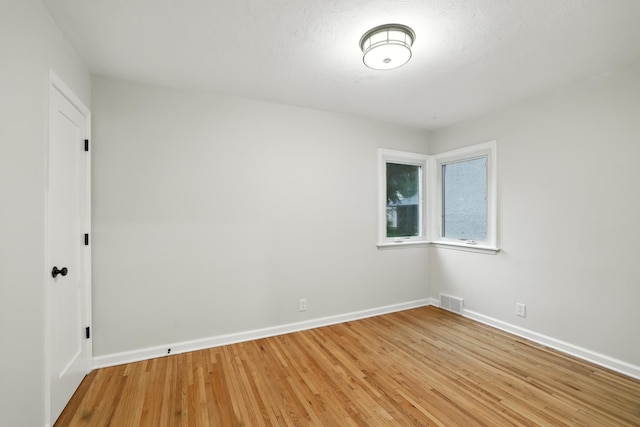 188 Cleveland Ave S, Saint Paul, MN 55105 - empty room featuring baseboards and light wood-style flooring