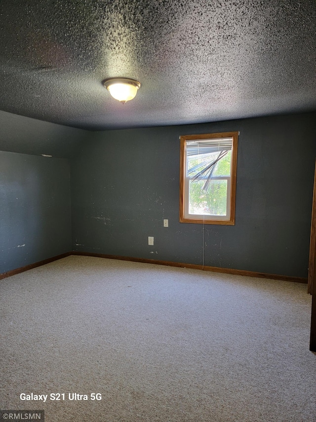 150 Gillis Ave S, Browerville, MN 56438 - unfurnished room with carpet floors and a textured ceiling
