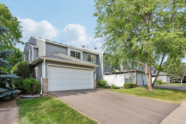 2001 Gresham Ave N, Oakdale, MN 55128 - traditional home with driveway and brick siding