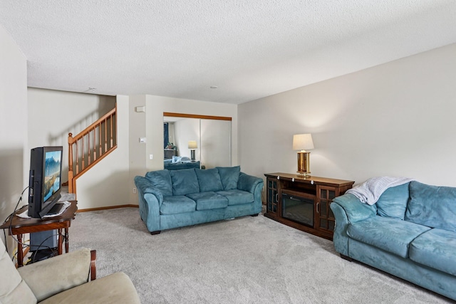 2001 Gresham Ave N, Oakdale, MN 55128 - living area featuring carpet floors, stairway, and a textured ceiling