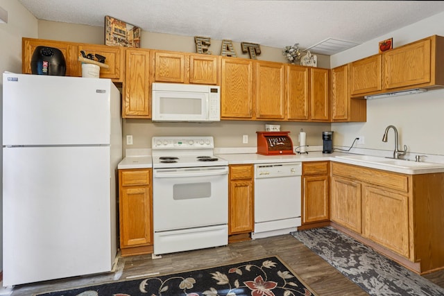 2001 Gresham Ave N, Oakdale, MN 55128 - kitchen with white appliances, light countertops, dark wood-style flooring, and a textured ceiling