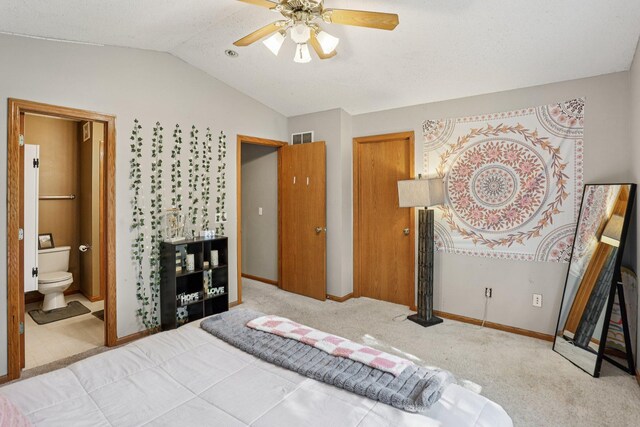 2001 Gresham Ave N, Oakdale, MN 55128 - carpeted bedroom featuring lofted ceiling, ensuite bath, and ceiling fan