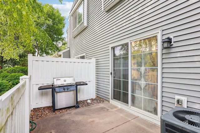 2001 Gresham Ave N, Oakdale, MN 55128 - view of patio / terrace featuring a grill