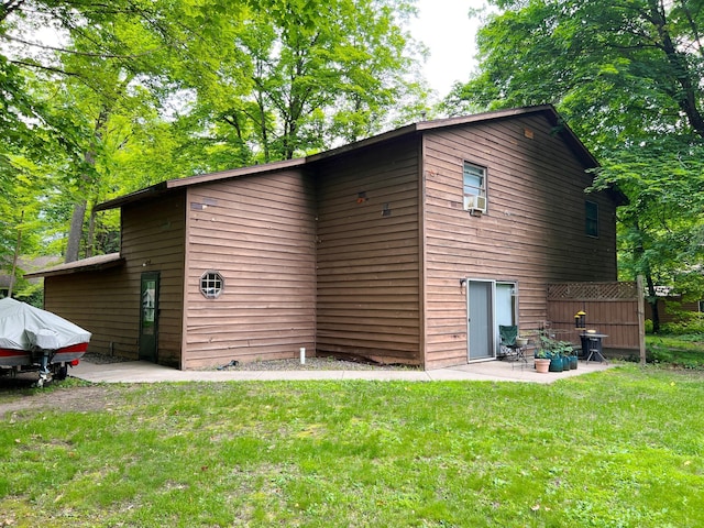 5019/5021 Ojibwa Rd, Brainerd, MN 56401 - back of house featuring a yard and a patio area