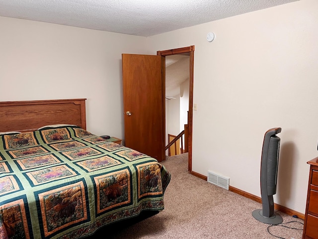 5019/5021 Ojibwa Rd, Brainerd, MN 56401 - bedroom featuring carpet floors and a textured ceiling