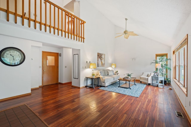 20170 Oxboro Ln N, Scandia, MN 55047 - living room featuring a ceiling fan, wood finished floors, and high vaulted ceiling