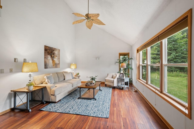 20170 Oxboro Ln N, Scandia, MN 55047 - living area with hardwood / wood-style flooring, a ceiling fan, and high vaulted ceiling