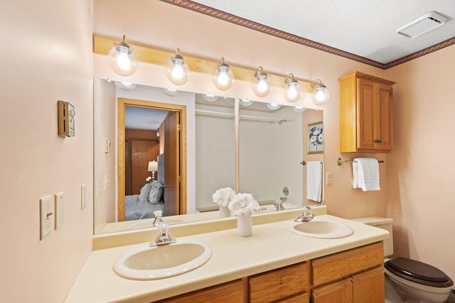 20170 Oxboro Ln N, Scandia, MN 55047 - bathroom featuring double vanity and ornamental molding