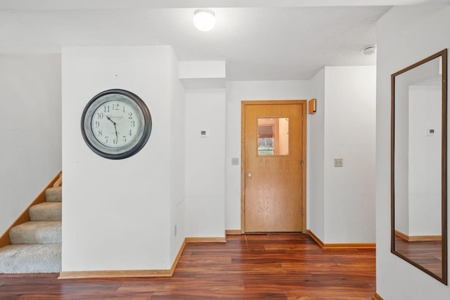 20170 Oxboro Ln N, Scandia, MN 55047 - corridor featuring wood finished floors, stairs, and a textured ceiling