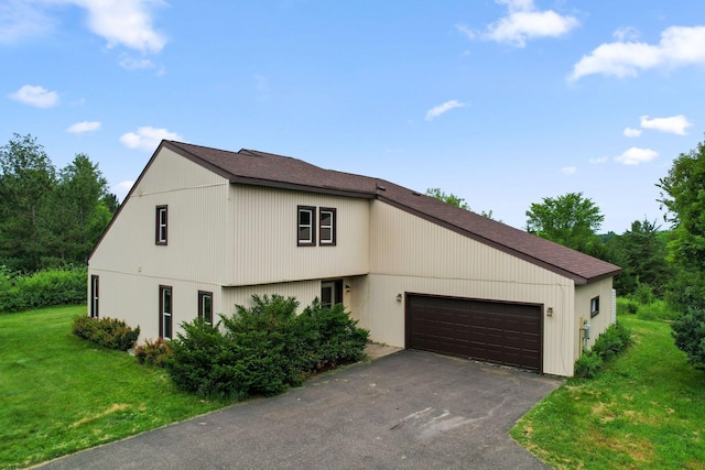 20170 Oxboro Ln N, Scandia, MN 55047 - view of front of house with a garage, a front lawn, asphalt driveway, and roof with shingles