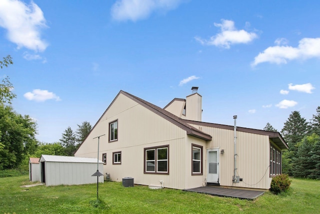 20170 Oxboro Ln N, Scandia, MN 55047 - back of property with a yard, a chimney, and a wooden deck